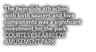 The twin slide attraction with both saucers and hive components was a significant investment for the park. COURTESY S...