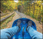 Mountain Coaster at Mt  Van Hoevenberg Olympic Sports Complex  The track resembles the 1980 Olympic Bobsled run and at 7600 ft is the longest Mountain Coaster in the United States,  The family-friendly ride can reach speeds of up to 25mph, Lake Placid, Essex County, Adirondacks Region