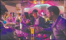 Passengers enjoy the Halcyon starcruiser dining experience in the Crown of Corella Dining Room in Star Wars: Galactic Starcruiser at Walt Disney World Resort in Lake Buena Vista, Fla  (Matt Stroshane, photographer)