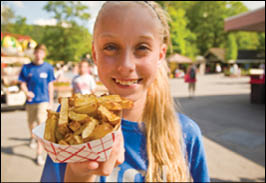 Knoebels Grove Amusement Park. Child with french fries.
