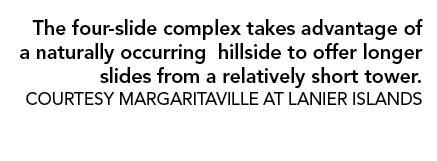 The four slide complex takes advantage of a naturally occurring hillside to offer longer slides from a relatively sho...