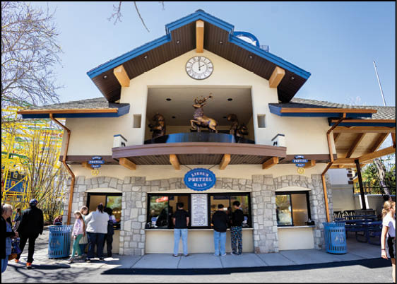 A clock on the side of a building. Description generated by AI