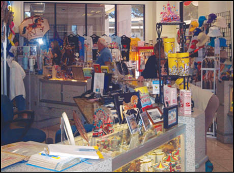 A store with a lot of jewelry and knick knacks. Description generated by AI