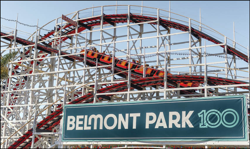 A roller coaster at a theme park. Description generated by AI