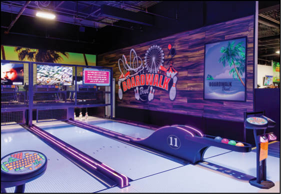 A bowling alley with a purple ceiling. Description generated by AI