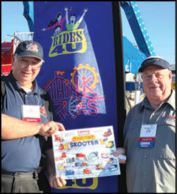 A man holding a sign that says “Think 40". Description generated by AI