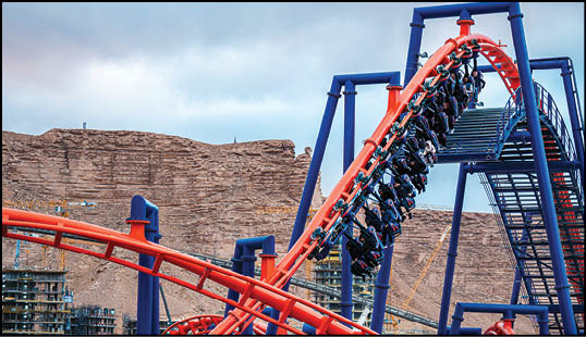 A roller coaster with a blue and red color scheme. Description generated by AI