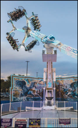 A large white ferris wheel with a blue roof. Description generated by AI