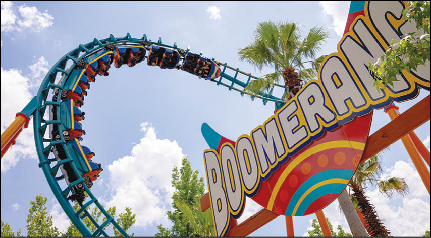 A roller coaster with the word Boomerang on it. Description generated by AI
