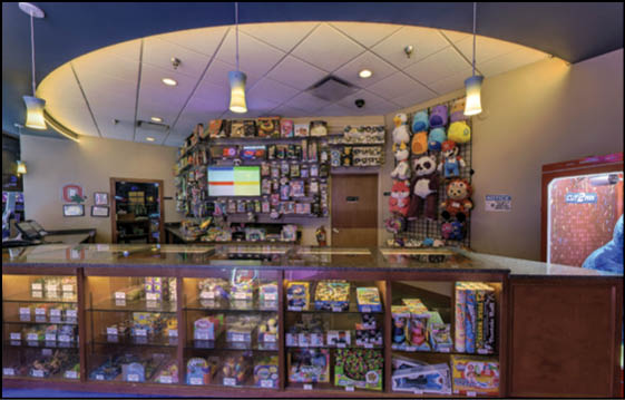 A store with a lot of merchandise. Description generated by AI