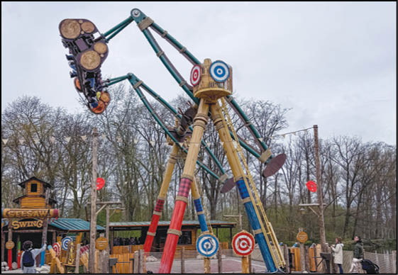 A carousel with a blue, red, and yellow color scheme. Description generated by AI