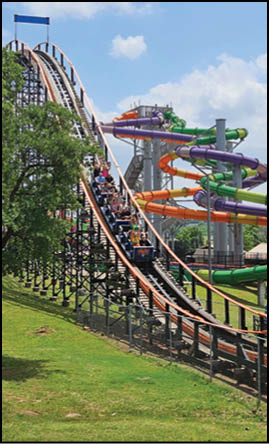 A roller coaster with a blue and yellow track. Description generated by AI