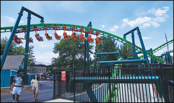 A roller coaster with the word Boomerang on it. Description generated by AI