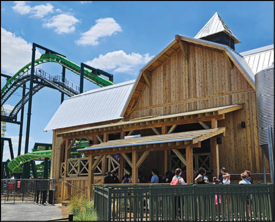 A roller coaster with the word Boomerang on it. Description generated by AI