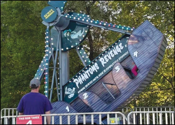 A blue and yellow tent with a sign that says “Buy or Reload Cards Here". Description generated by AI