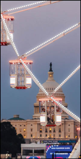 A blue and yellow tent with a sign that says “Buy or Reload Cards Here". Description generated by AI