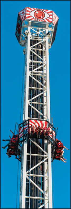 A blue and yellow tent with a sign that says “Buy or Reload Cards Here". Description generated by AI