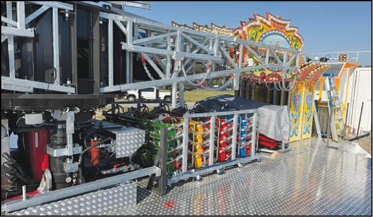 A blue and yellow tent with a sign that says “Buy or Reload Cards Here". Description generated by AI