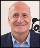 A man wearing a white shirt and black jacket. Description generated by AI