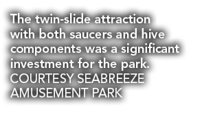 The twin slide attraction with both saucers and hive components was a significant investment for the park. COURTESY S...