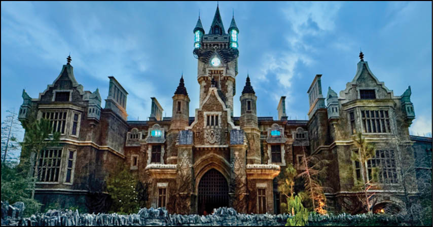 A large, ornate stone castle with multiple towers and turrets is set against a cloudy blue sky during twilight. Description generated by AI